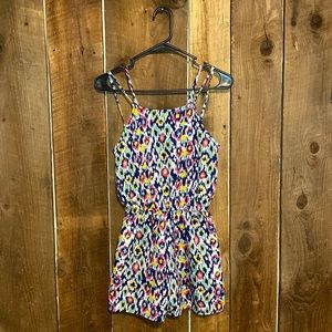 Bright and flirty romper size s/m